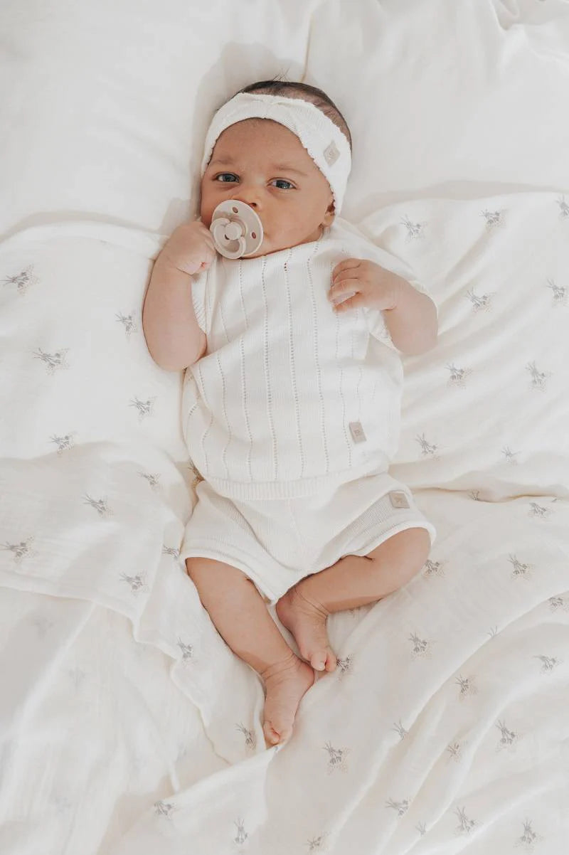 Knitted striped romper WHITE- on baby 2