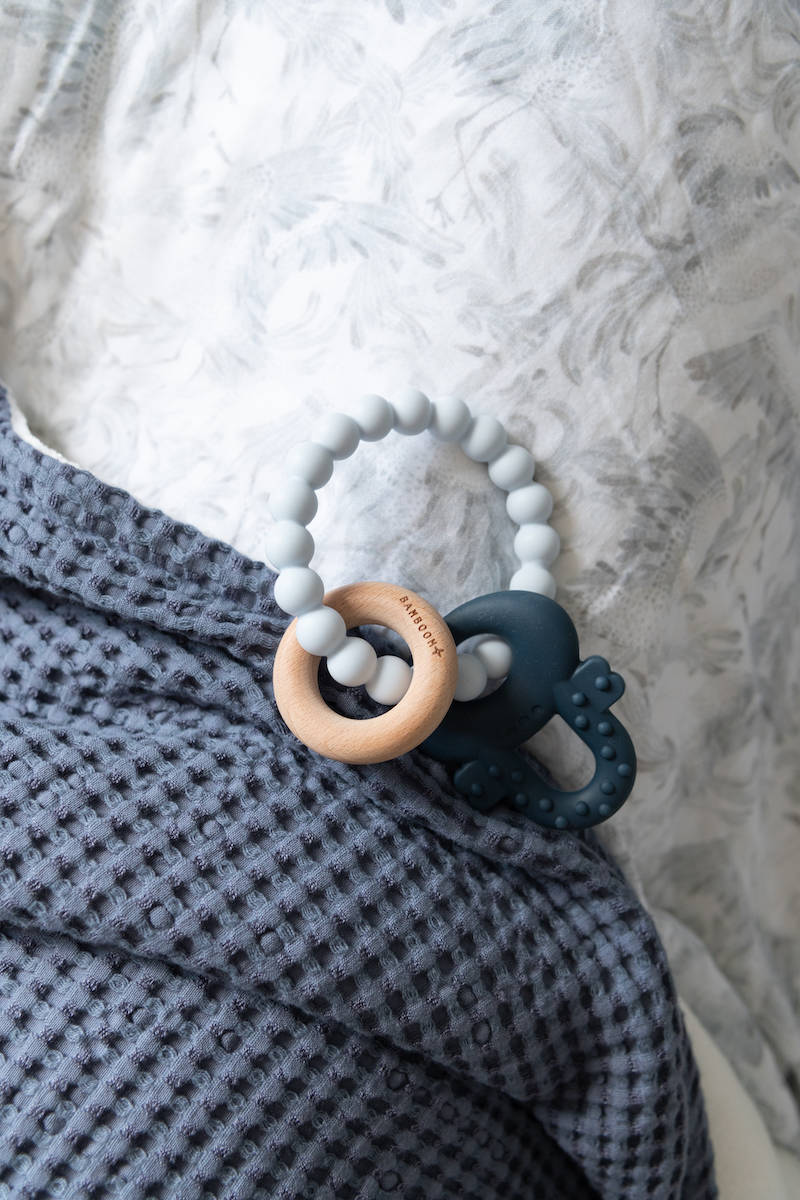 Wood Silicone Key Teething Ring Blue- on blanket