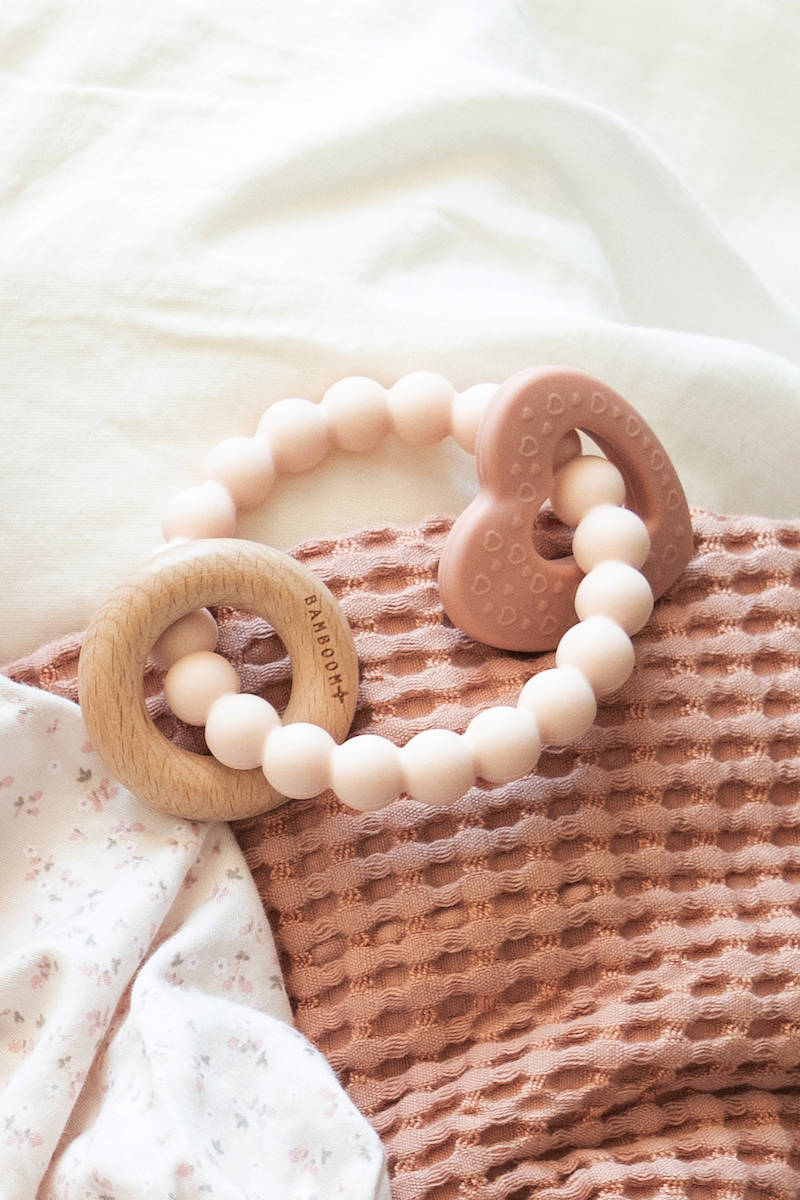 Wood Silicone Key Teething Ring Rosa- on blanket