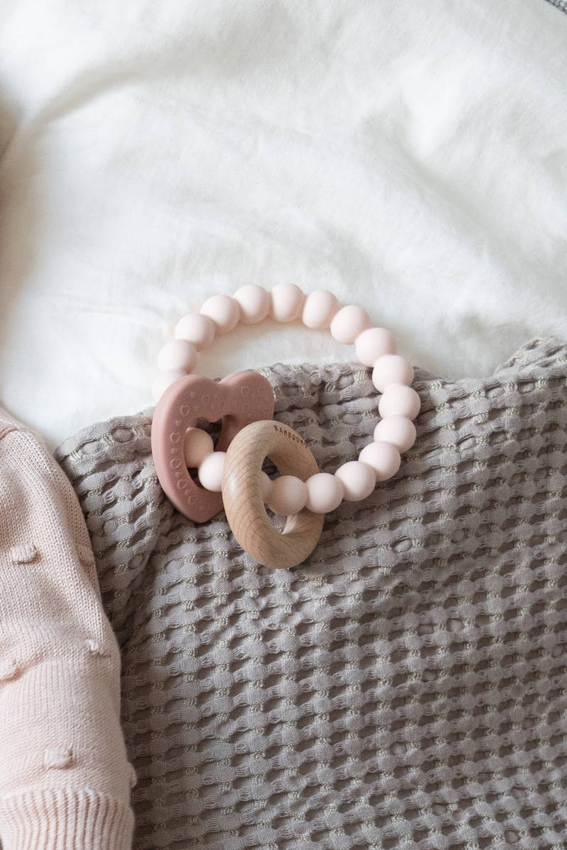 Wood Silicone Key Teething Ring Rosa- on blanket 2