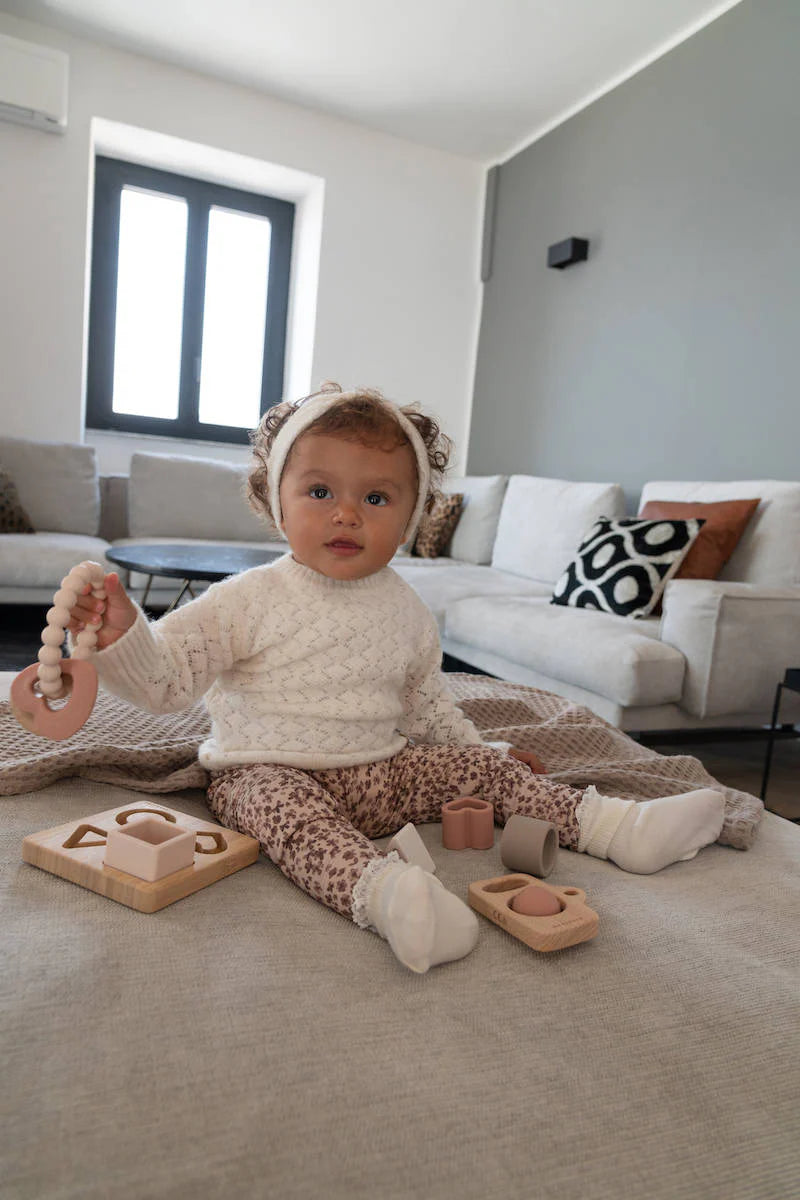 Wood Silicone Key Teething Ring Rosa- girl playing
